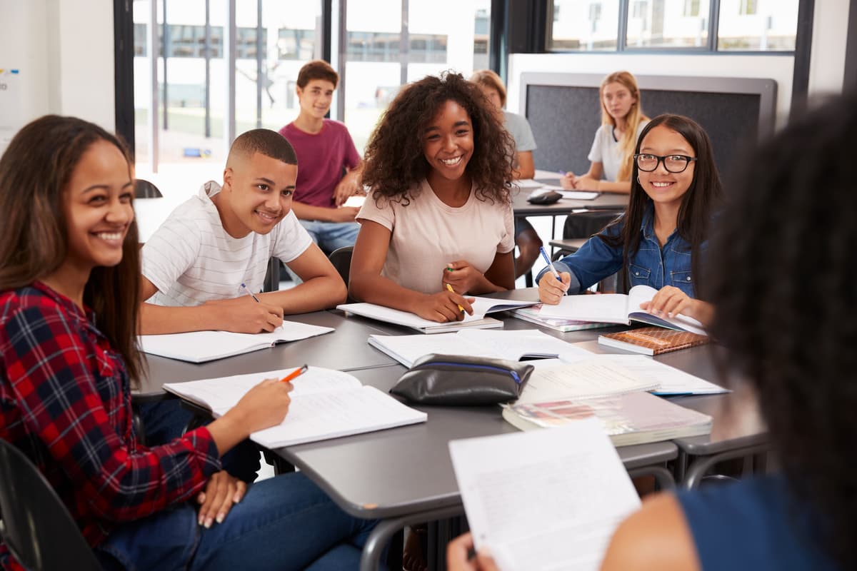 High school students studying together in a classroom
